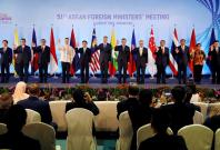 Singapore’s Prime Minister Lee Hsien Loong and ASEAN foreign ministers pose for a group photo during the opening ceremony of the 51st ASEAN Foreign Ministers' Meeting in Singapore August 2, 2018. 