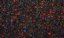 There are colorful stars galore, but likely no habitable planets, inside the globular star cluster 