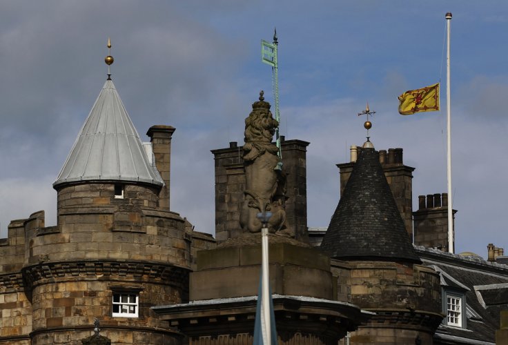 A Lion Rampant flag, the Royal Standard of Scotland, flies at half mast after the death of former British prime minister Margaret Thatcher, over the Palace of Holyroodhouse in Edinburgh, Scotland April 8, 2013. Thatcher, the "Iron Lady" who dominated Brit