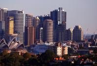 Cranes can be seen on a construction site at the inner-city suburb of Barangaroo, the site of the Australian casino operator Crown Resorts new Sydney waterfront resort, with the Sydney Opera House located on Sydney Harbour in Australia, August 9, 2018. RE Cranes can be seen on a construction site at the inner-city suburb of Barangaroo, the site of the Australian casino operator Crown Resorts new Sydney waterfront resort, with the Sydney Opera House located on Sydney Harbour in Australia, August 9, 2018. RE