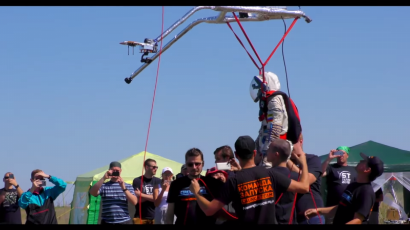 The test launch of the space suit and balloons