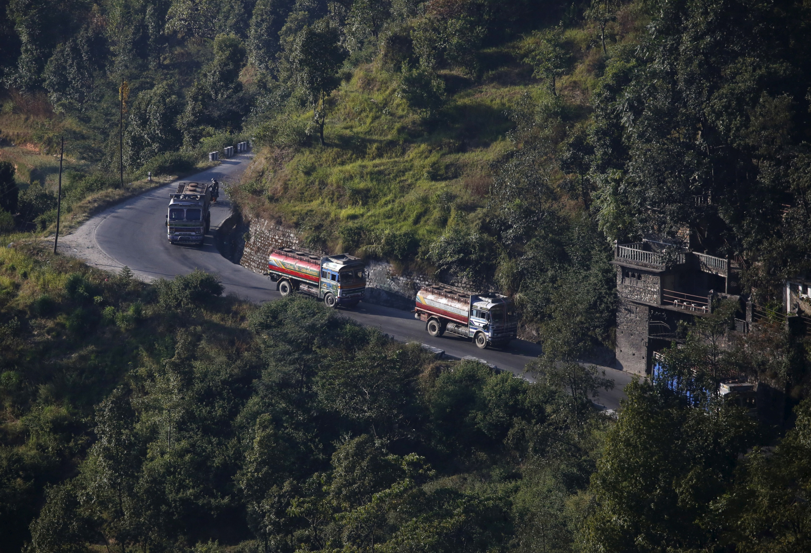 Nepalese petrol tankers heading to the Chinese border of Kerung are pictured on a road on the outskirts of Kathmandu, Nepal November 2, 2015. 