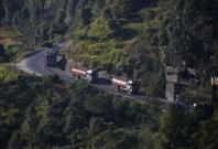 Nepalese petrol tankers heading to the Chinese border of Kerung are pictured on a road on the outskirts of Kathmandu, Nepal November 2, 2015. 