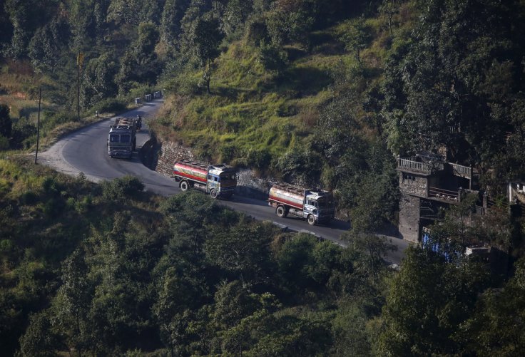 Nepalese petrol tankers heading to the Chinese border of Kerung are pictured on a road on the outskirts of Kathmandu, Nepal November 2, 2015. Nepalese petrol tankers heading to the Chinese border of Kerung are pictured on a road on the outskirts of Kathmandu, Nepal November 2, 2015.