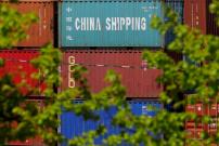  Shipping containers, including one labelled "China Shipping," are stacked at the Paul W. Conley Container Terminal in Boston, Massachusetts, U.S., May 9, 2018. REUTERS/Brian Snyder/File Photo