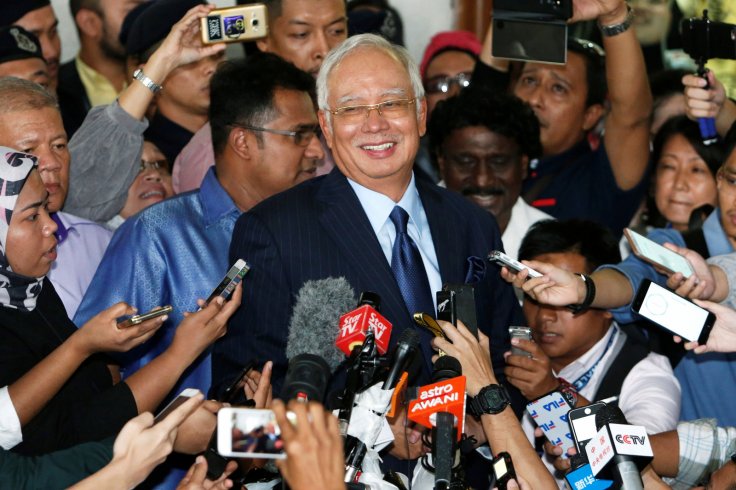 Malaysia's former Prime Minister Najib Razak speaks to journalists as he leaves a court in Kuala Lumpur, Malaysia September 20, 2018. REUTERS/Lai Seng Sin