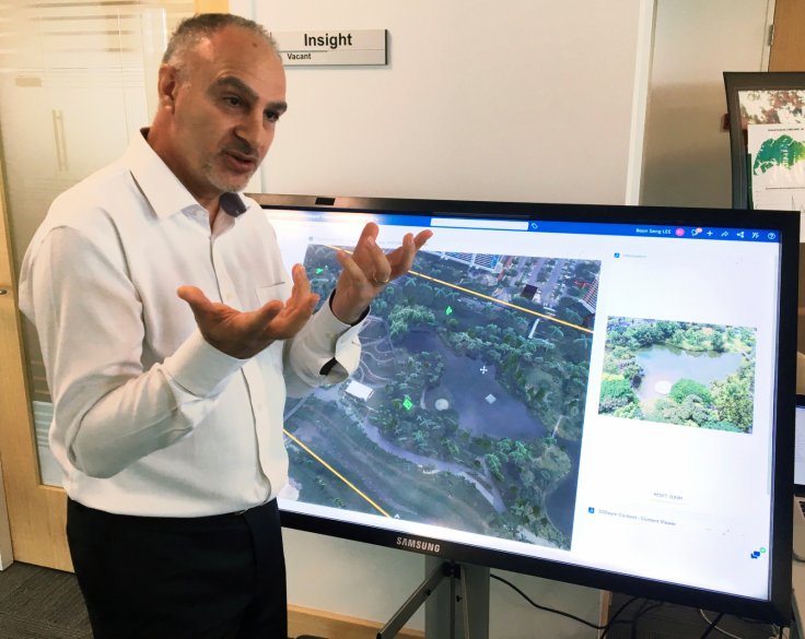 Alexandre Parilusyan of Dassault Systemes showcases Virtual Singapore, a detailed 3D model of the city-state that will be fed with big data and could assist in everything from urban planning to disaster mitigation, at the National Research Foundation offi