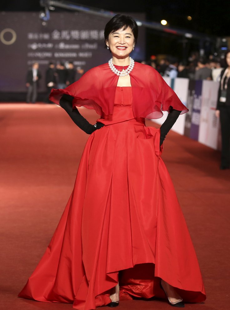 Taiwanese actress Brigitte Lin poses for photographers on the red carpet at the 50th Golden Horse Film Awards in Taipei November 23, 2013. REUTERS/Patrick Lin 