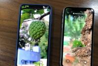 Apple iPhone XS Max (left) placed beside the iPhone XR (right).