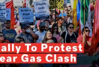 americans-march-along-south-border-to-protest-tear-gas-clash americans-march-along-south-border-to-protest-tear-gas-clash