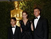 Angelina Jolie and partner Brad Pitt son Maddox