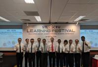 MoU signing ceremony between Dr Kwek Kok Kwong, CEO of NTUC LearningHub (third from left), Professor Wei Kwok Wee, Dean of School of Continuing and Lifelong Education, NUS (5th from left) and Mr Loganathan Ramasamy, CEO (Designate), ST Logistics was witne