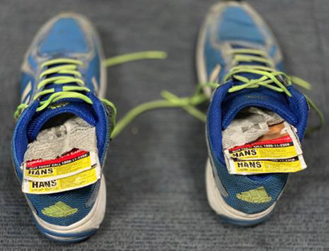 Packets of chewing tobacco hidden inside the motorcyclist’s shoes