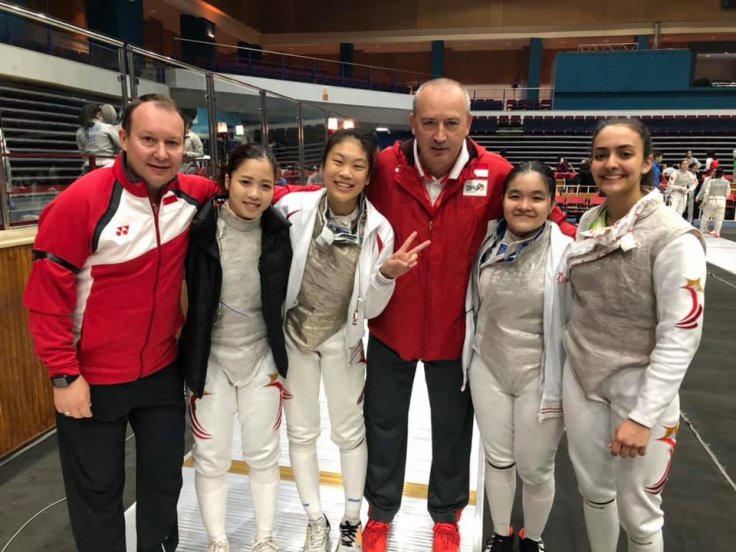 Foil national partner coach Viacheslav Bobok, fencers Tatiana Wong and Denyse Chan, national foil and head coach Andrey Klyushin, and fencers Maxine Wong and Amita Berthier, at the Asian Junior and Cadet Fencing Championships in Jordan.