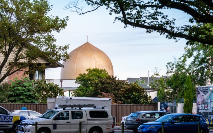 Police vehicles are seen outside a mosque in Christchurch, New Zealand, on March 16, 2019. The death toll from attacks on two mosques in New Zealand's Christchurch Friday rose to 49 and 48 others were wounded. (Xinhua/Zhu Qiping/IANS)