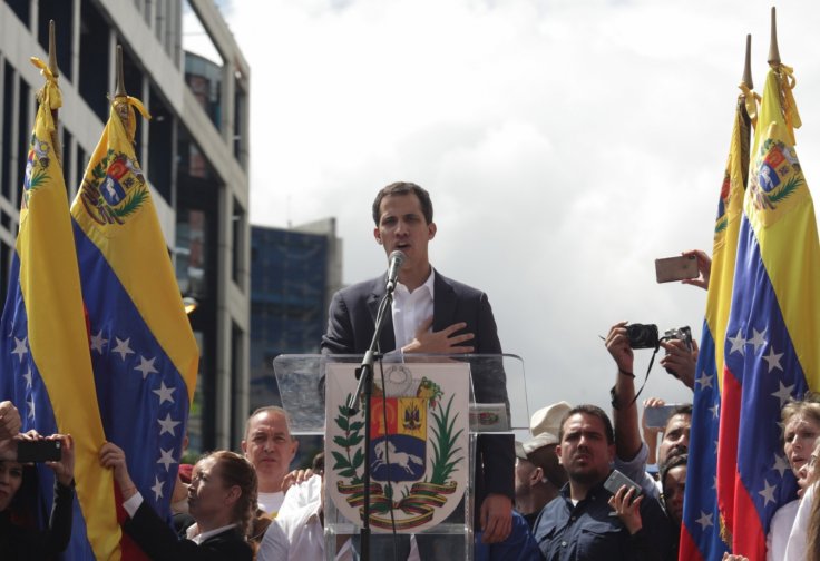 Juan Guaido (C), head of the opposition-controlled National Assembly, delivers a speech at the Francisco de Miranda avenue, in Caracas, Venezuela, on Jan. 23, 2019. Venezuelan President Nicolas Maduro on Wednesday announced he was severing "diplomatic and