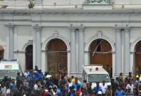  People gathered outside the Church of St. Anthony where the explosion occurred in Colombo, Sri Lanka, April 21, 2019. At least 50 people were killed and more than 100 others injured in multiple church and hotel blasts in Sri Lanka, police said on Sunday.