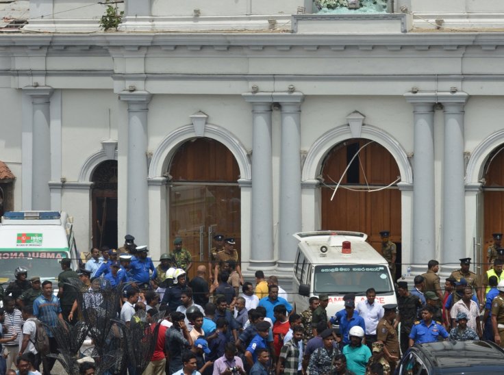  People gathered outside the Church of St. Anthony where the explosion occurred in Colombo, Sri Lanka, April 21, 2019. At least 50 people were killed and more than 100 others injured in multiple church and hotel blasts in Sri Lanka, police said on Sunday.