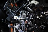 LOS ANGELES, June 1, 2014 (Xinhua) -- Surrendered handguns are displayed at a gun buyback event in Los Angeles, the United States, on May 31, 2014. People can exchange their firearms at four Los Angles-area locations for supermarket gift cards. The Citywi LOS ANGELES, June 1, 2014 (Xinhua) -- Surrendered handguns are displayed at a gun buyback event in Los Angeles, the United States, on May 31, 2014. People can exchange their firearms at four Los Angles-area locations for supermarket gift cards. The Citywi