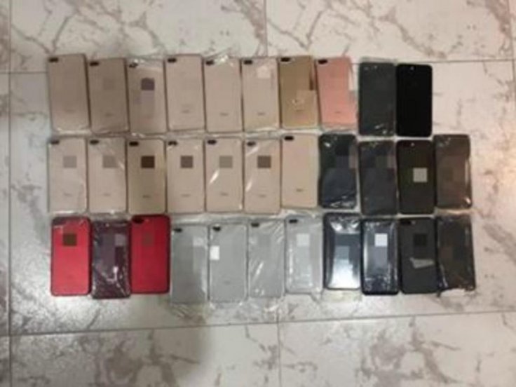 The police also seized 65 mobile phones and about S$6,000 in cash.