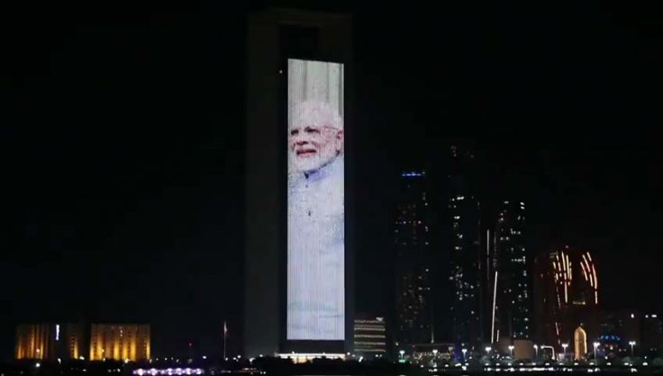 The facade of the ADNOC Group Tower in Abu Dhabi was lit up with the flags of India and the UAE and portraits of Prime Minister Narendra Modi and Abu Dhabi Crown Prince Mohammed bin Zayed Al Nahyan to mark the swearing in of the Indian leader, on May 30, 