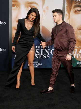 Priyanka Chopra and Nick Jonas on the Chasing Happiness premiere red carpet.