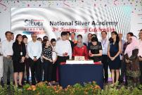 To celebrate the National Silver Academy 3rd ­anniversary, President Halimah Yacob participated in a cake-cutting ceremony along with NSA partners.