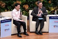 From left: Mr Heng and Prof Tan answering questions from the audience during their dialogue session