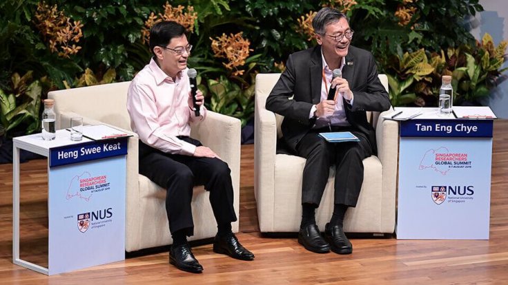From left: Mr Heng and Prof Tan answering questions from the audience during their dialogue session