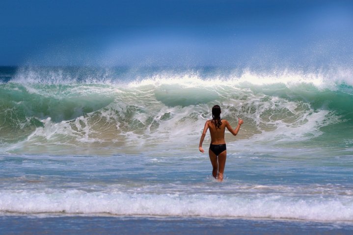 Topless Woman In Beach