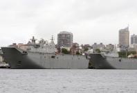 Australia raises defence spending by $21 bln; submarine fleet a priority Australia raises defence spending by $21 bln; submarine fleet a priority