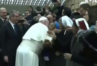 Pope kisses nun