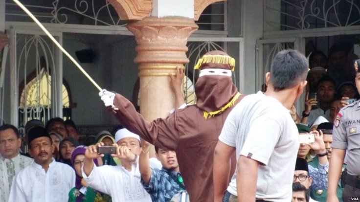 A caning sentence being carried out in Banda Aceh, 