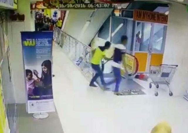 Malaysia toddler falls from escalator