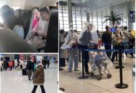 People spotted wrapping themselves in plastic covers People spotted wrapping themselves in plastic covers