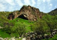 View of the entrance to Shanidar Cave, in the foothills of the Baradost Mountains of North-East Iraqi Kurdistan.