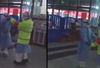 A nurse and a cop dancing outside a hospital in Wuhan, China A nurse and a cop dancing outside a hospital in Wuhan, China