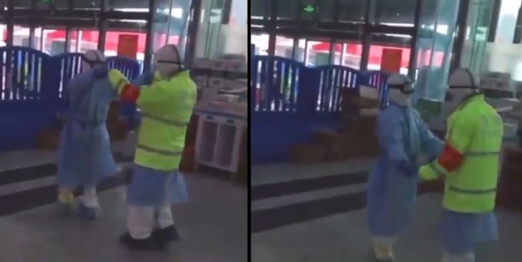 A nurse and a cop dancing outside a hospital in Wuhan, China 