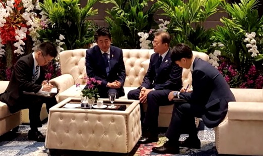 Moon Jae-in with Shinzo Abe