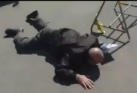 Fallen man outside Iranian hospital