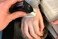 The US school teacher stamps on the hands of kids so that they wash it frequently The US school teacher stamps on the hands of kids so that they wash it frequently