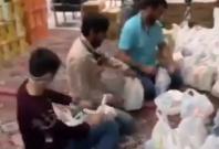 Youth in Qom packing food Youth in Qom packing food