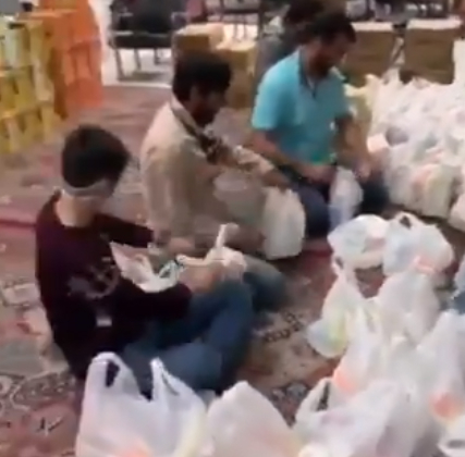 Youth in Qom packing food