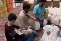 Youth in Qom packing food