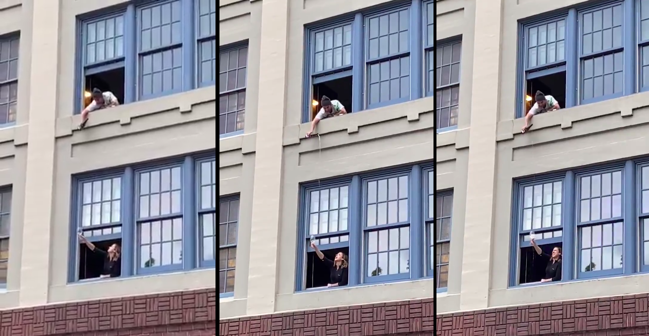 Video of a man offering wine to neighbour girl through window goes viral amid Coronavirus lockdown in Italy