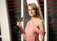 Actress Brie Larson holds her award for Best Actress i