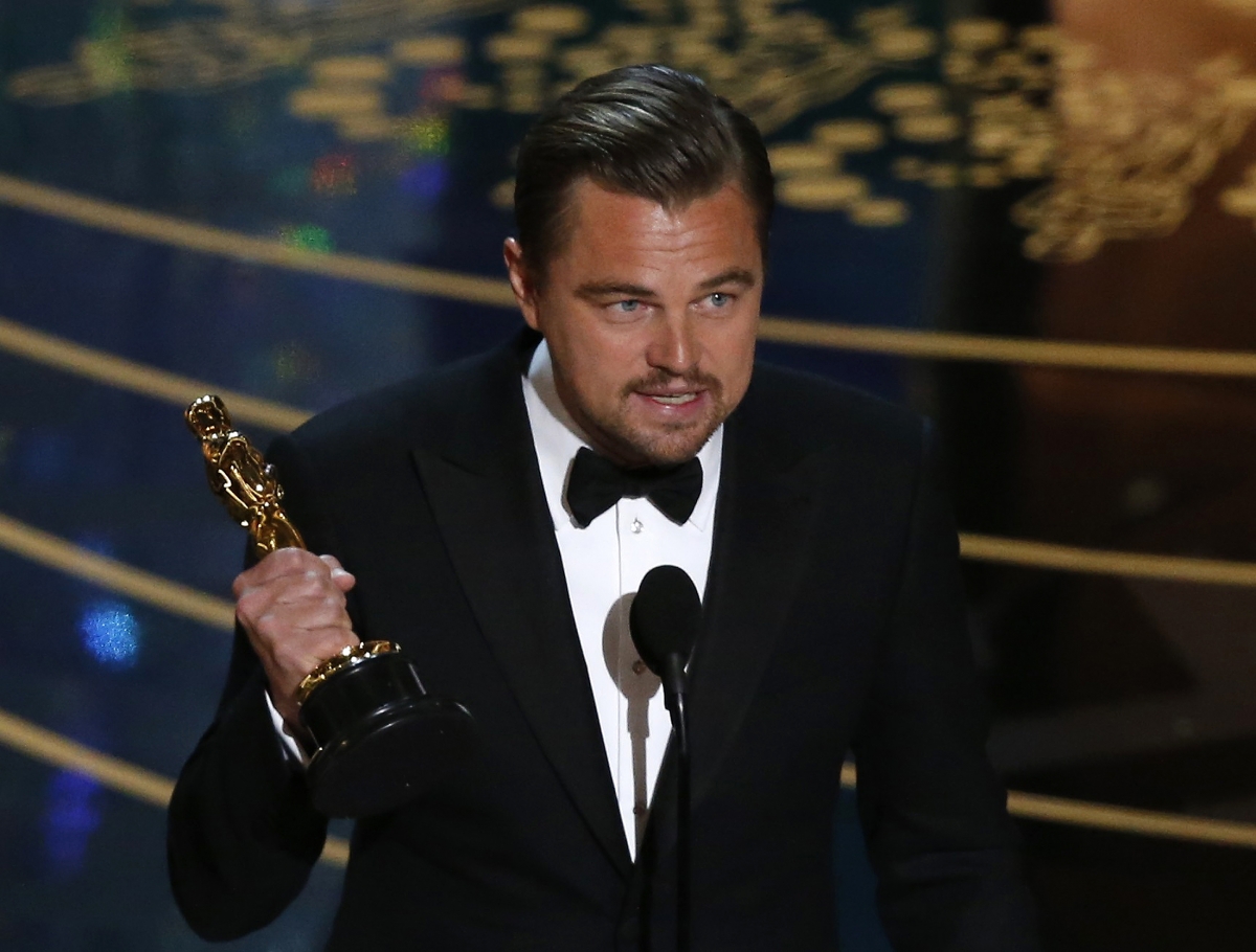 Leonardo DiCaprio brings climate change to Oscar stage with appeal for