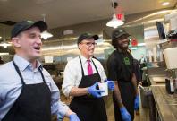 Secretary of Labor Thomas Perez tours the Shake Shack Restaurant with CEO Randy Garutti. Secretary of Labor Thomas Perez tours the Shake Shack Restaurant with CEO Randy Garutti.