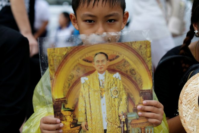 Long live the Thai King: Mourners queue outside Bangkok's Grand Palace to pay tribute