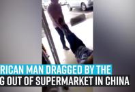 african-man-dragged-by-the-leg-out-of-supermarket-in-china african-man-dragged-by-the-leg-out-of-supermarket-in-china